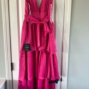 Hot pink dress! New with tags on it! Would be perfect for weddings or promo!